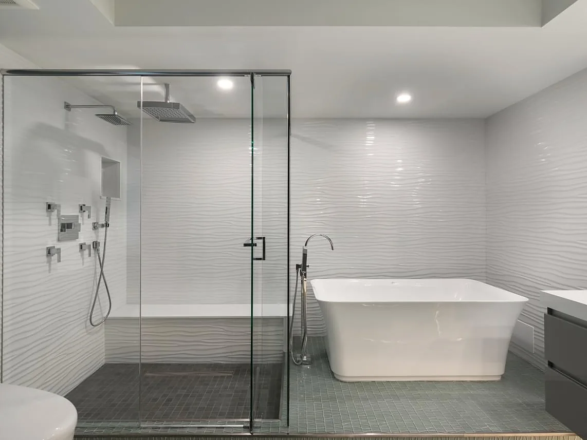Master bathroom remodel with glass walk-in shower and soaking tub